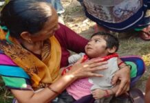 बिजनौर में महिला का अधजला शव मिला, पास रोती मिली बच्ची